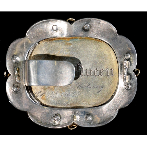 38 - ROYAL.  A PARCEL GILT SILVER BROOCH with cast oblong engraved bas relief view of a schloss, possibly... 