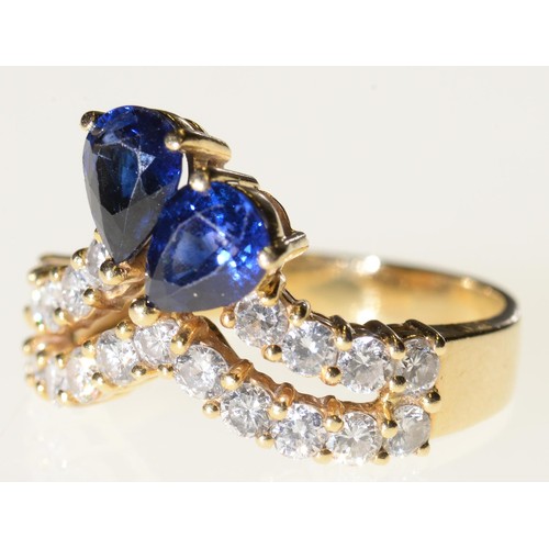 32 - A SAPPHIRE AND DIAMOND DART RING  in gold, marked 18k, 6.5g, size N½