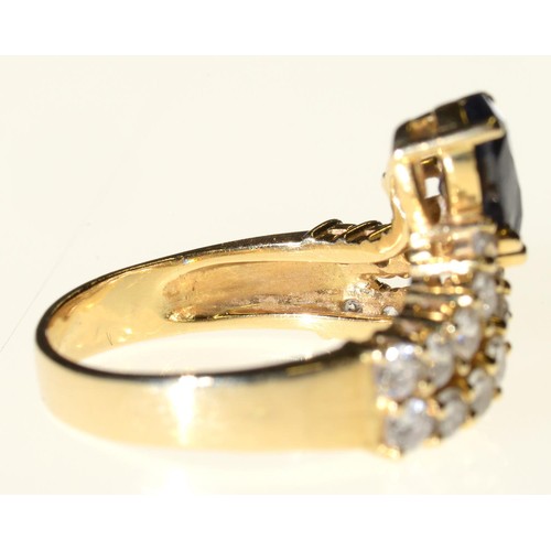 32 - A SAPPHIRE AND DIAMOND DART RING  in gold, marked 18k, 6.5g, size N½