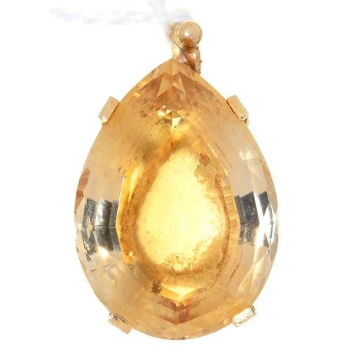 47 - A PEAR SHAPED CITRINE PENDANT MOUNTED IN GOLD, 31MM, UNMARKED, 9.7G