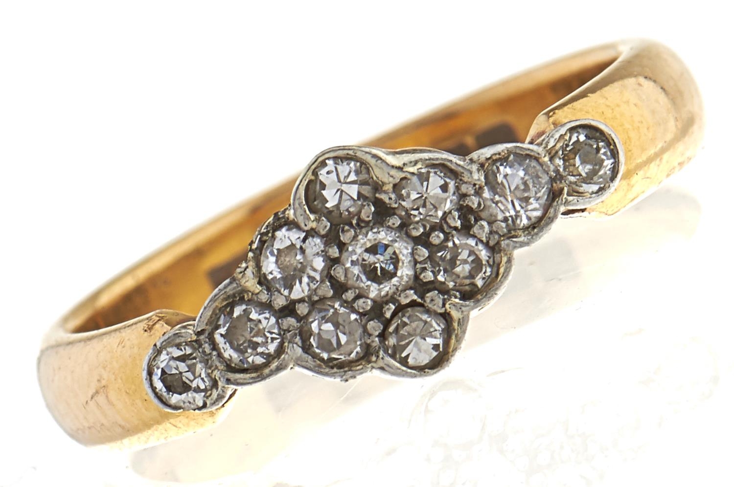 A diamond cluster ring, in 22ct gold, adapted, 4.9g size M½