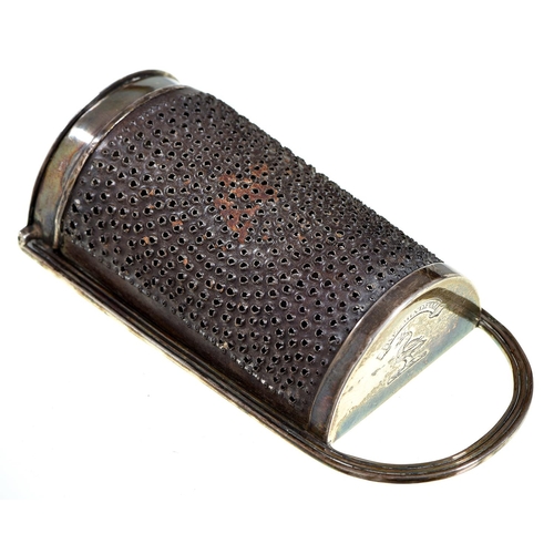 29 - A George III silver nutmeg grater, with reeded frame and steel rasp, integral hinge, crested, 10cm h... 