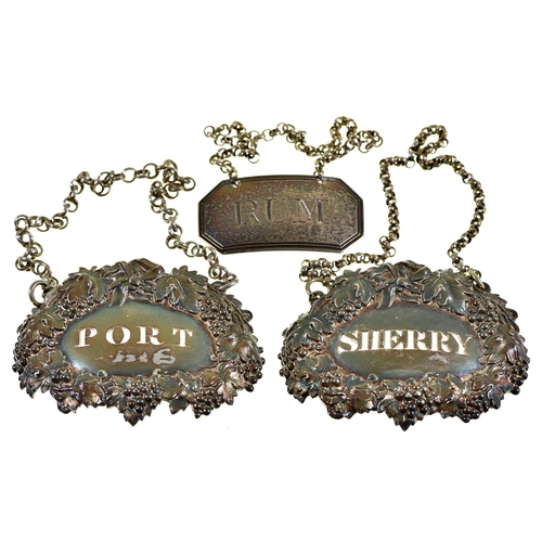 40 - A pair of George IV die stamped silver wine labels - Port and Sherry, in grapevine surround, 62mm lo... 