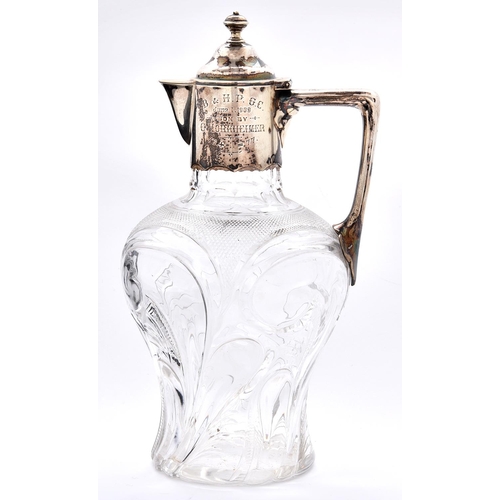 51 - An Edward VII silver mounted cut glass claret jug, of inverted baluster shape with angular handle, 2... 