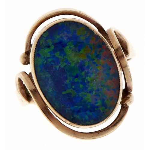 11 - A synthetic opal doublet ring, in gold, marked 9ct, 5.3g, size N