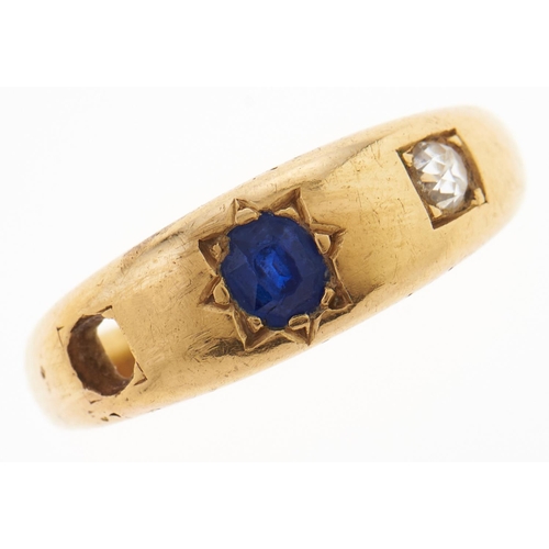 32 - A sapphire and diamond ring, c1900, gipsy set, in gold, marked 18ct, 6.1g, size S