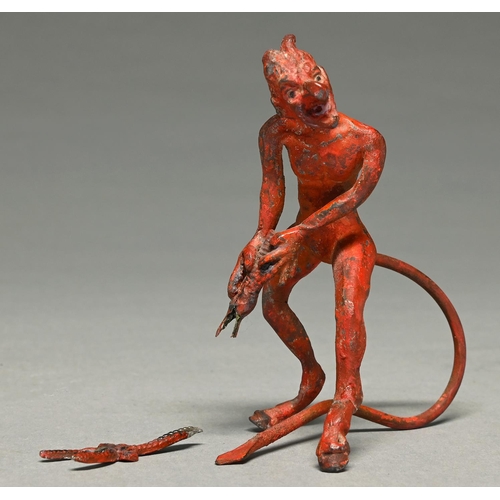 1122 - A miniature cold painted spelter statuette of the devil wresting with a scorpion, c1900,  ... 