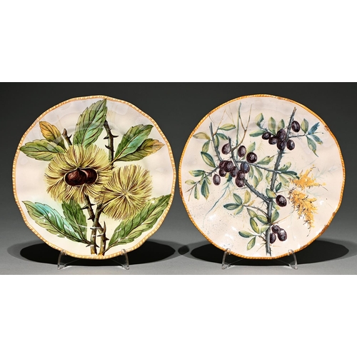 920 - Two Cantagalli shaped circular faience plates, one painted with horse chestnuts, the other with berr... 