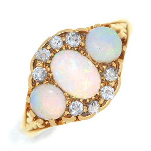 14 - An opal and diamond ring, in 18ct gold, Chester 1938, 4.4g, size K½