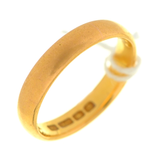 19 - A 22ct gold wedding ring, London 1956, 5g, size M½