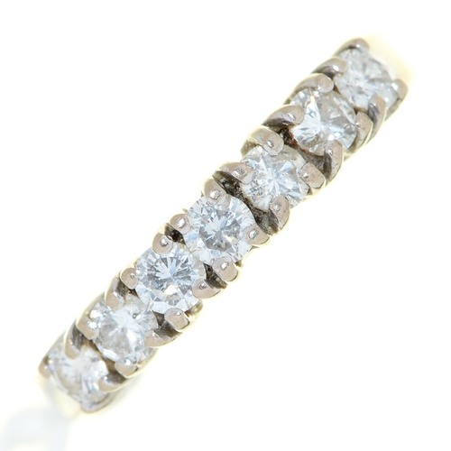 25 - A seven stone diamond ring, in 18ct white gold, Birmingham 1999, 3.8g, size N½... 