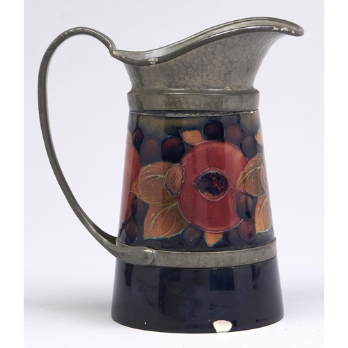 502 - A Moorcroft pewter mounted Pomegranate jug, c1918-29, 14.5cm h