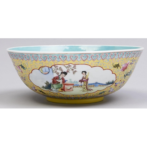 504 - A Chinese yellow ground famille rose bowl, 20th c, the interior turquoise, 23cm diam, Qianlong mark... 