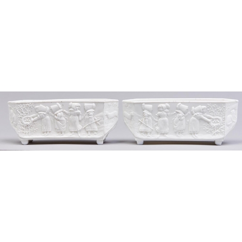 508 - A pair of Sowerby pressed  glass Blanc de Lait flower troughs, c1880,  the sides moulded with childr... 