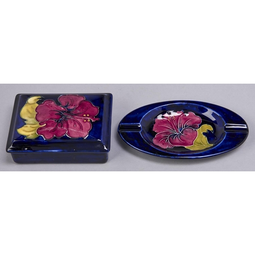 525 - A Moorcroft Hibiscus box and cover and ashtray, c1970, ashtray 16cm l, impressed marks... 