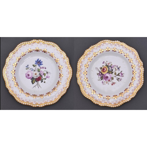 536 - A pair of Copeland and Garrett dessert plates, 1833-47, painted to the centre with a loose bouquet i... 