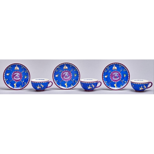551 - Advertising. A set of three Wedgwood & Co Cadbury's chocolate cups and saucers, c1936, with blue... 