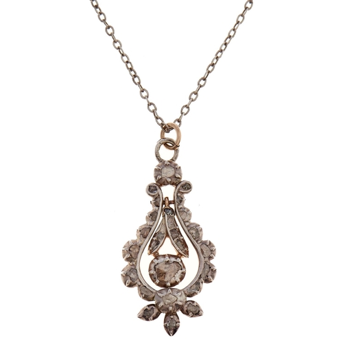 57 - A diamond pendant, early 20th c,  with Dutch rose cut diamonds, in silver, articulated, 34mm an... 