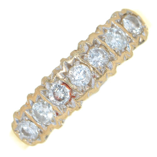 46 - A seven stone diamond ring, in 9ct gold, 2.7g, size N