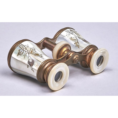 543 - A pair of French gilt brass and decorated mother of pearl opera glasses, c1900