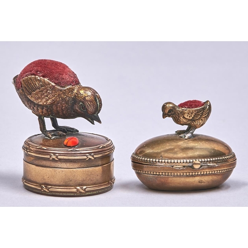 544 - A gilt brass ladybird and chick novelty combination pin cushion and trinket box and another,  egg sh... 