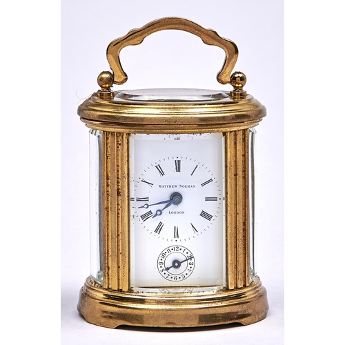 549 - A Matthew Norman miniature oval brass carriage timepiece with alarm, 80cm excluding handle... 