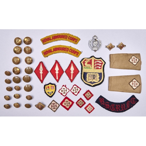 550 - Militaria. A quantity of British Army brass and other tunic buttons, cap badge and cloth insignia, e... 