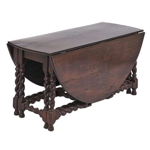 1 - An oak double gateleg table, 19th c, with substantial spiral turned legs, stretchers and gates, 72cm... 