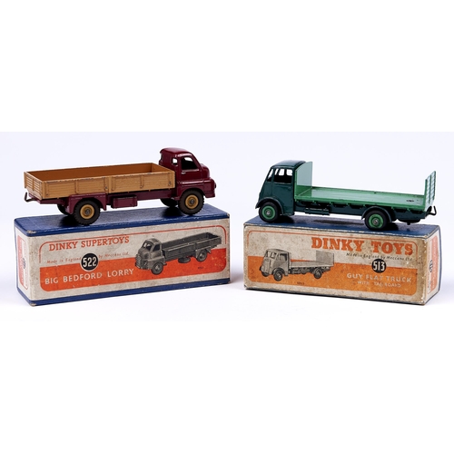 1093 - Dinky Toys 513 Guy flat truck with tailboard, two tone green, boxed, VG with wear mainly on cab roof... 