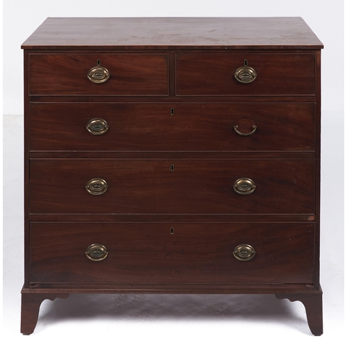 20 - A George III mahogany chest of drawers, having oak lined drawers, the oval brass handles original, o... 
