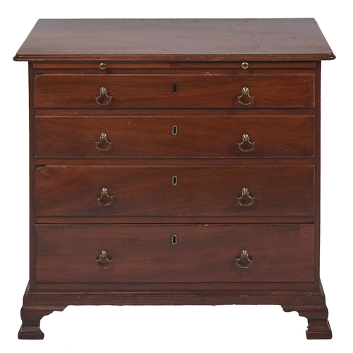 23 - A George III padouk chest of drawers, having oak lined drawers, brushing slide and brass drop handle... 