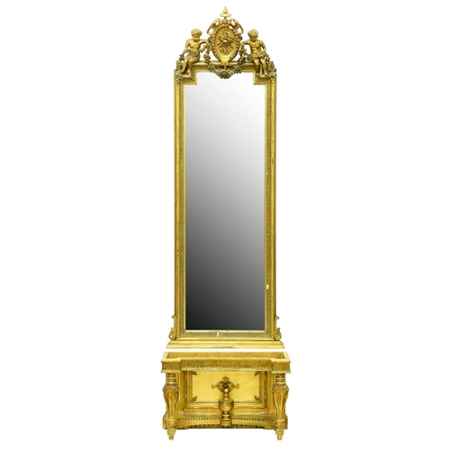 32 - A Victorian giltwood and composition pier mirror, the arched carvetto frame surmounted by a medallio... 