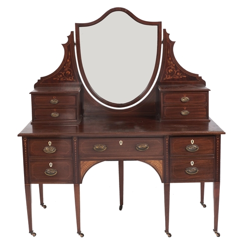36 - An Edwardian mahogany and inlaid dressing table, with shield shaped mirror, 184cm h; 55 x 153cm... 