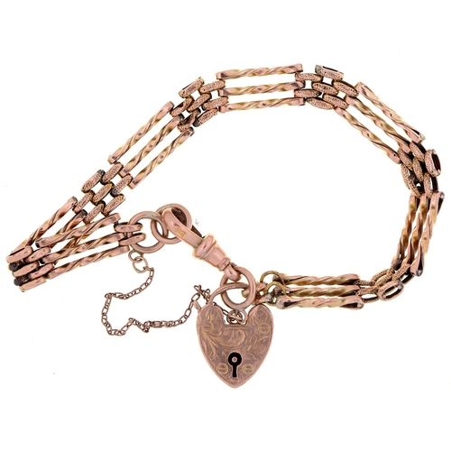 535 - A gold gate bracelet and padlock, 20cm l, marked 9c, 10.5g
