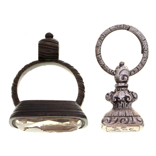 541 - A silver fob seal, mid 19th c, engraved flower and zacy, 28mm h, on a chased silver split ring and a... 