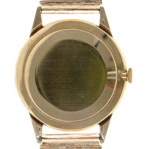 556 - A Rotary 9ct gold gentleman's wristwatch, import marked Glasgow 1961, 33mm diam, on a 9ct gold brace... 
