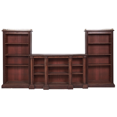 8 - A William IV mahogany breakfront library bookcase, in three sections with brass galleries and a numb... 