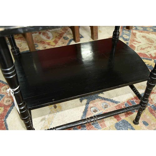 58 - A Victorian 'Anglo-Japanese' ebonised two tier occasional table, the design in the manner of E W God... 
