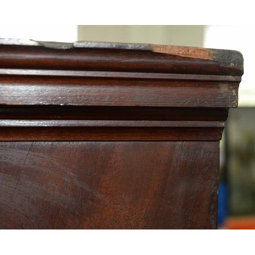 25 - A mahogany bookcase, early 19th c, with stepped cornice and figured frieze, fitted with adjustable s... 