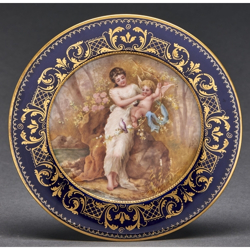 26A - A Vienna style plate, c1900, painted by Hauser, signed, with a maiden and playful putto in a glade, ... 