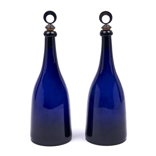 3 - A pair of cobalt blue glass taper decanters, early 19th c, sharp pontil scar, 27.5cm h excluding lat... 