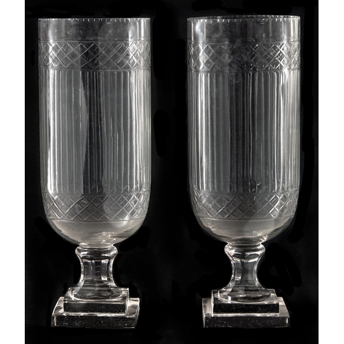 48 - A pair of cut glass storm shades, 20th c, on stepped square foot, 40cm h
