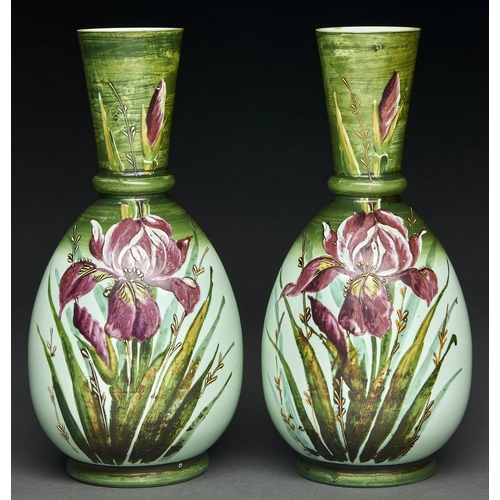 50 - A pair of Victorian cold painted green glass vases, decorated with bearded iris, 36cm h... 