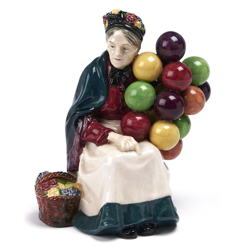 86 - A Royal Doulton earthenware figure of the Old Balloon Seller, 1932, 18.5cm h, impressed date, printe... 