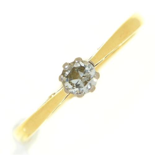 12 - A diamond solitaire ring, in 18ct gold, Birmingham 1975, 2.1g, size N