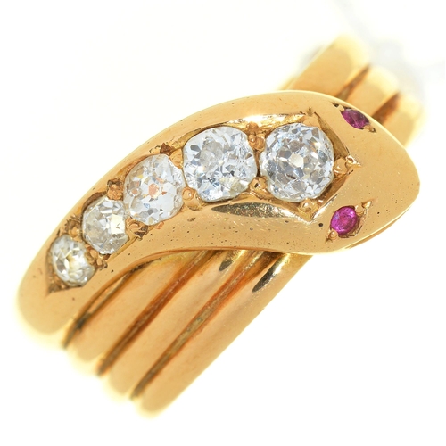 13 - A diamond serpent ring, with ruby eyes, in gold marked 18ct, 11.7g, size Y