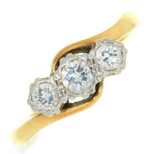15 - A three stone diamond ring, gold hoop marked 18ct PLAT, 3.4g, size O½