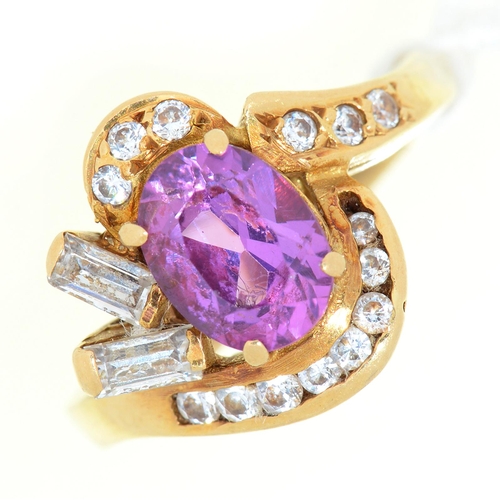 4 - An amethyst and diamond cluster ring, in gold marked 750, 5.7g, size J½