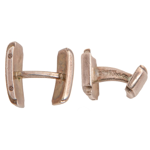 43 - Tiffany & Co. A pair of rigid silver cufflinks, 19mm, maker's marks and ©, London 2008, 13d... 