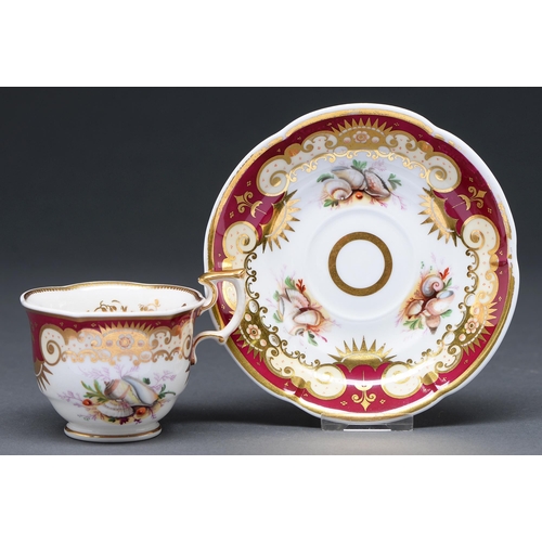 456 - A Yates coffee cup and saucer, c1830, of Persian shaped, finely painted with seashells beneath richl... 